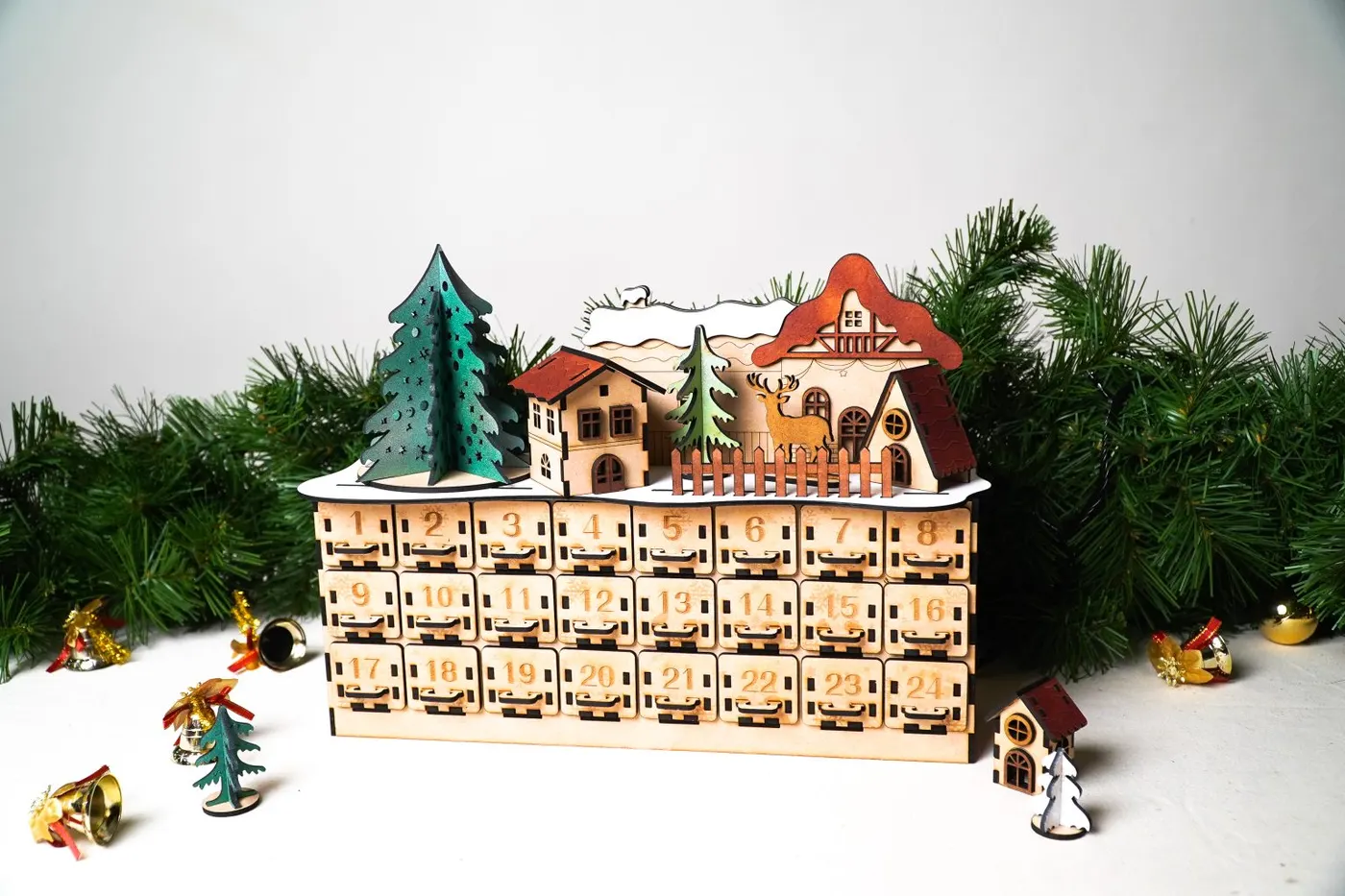 Laser-cut wooden advent calendar with numbered drawers