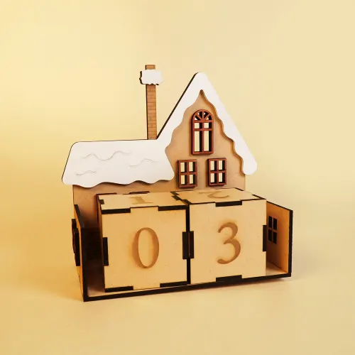 Laser-cut wooden house advent calendar