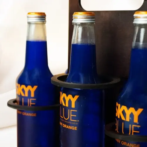 Portable rack holding six beverage bottles