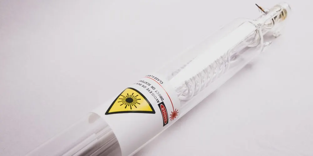 Glass CO₂ laser tube with its electrical and cooling connections