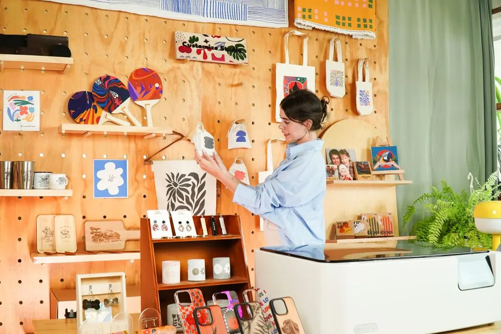Laser-crafted products displayed in a creative studio