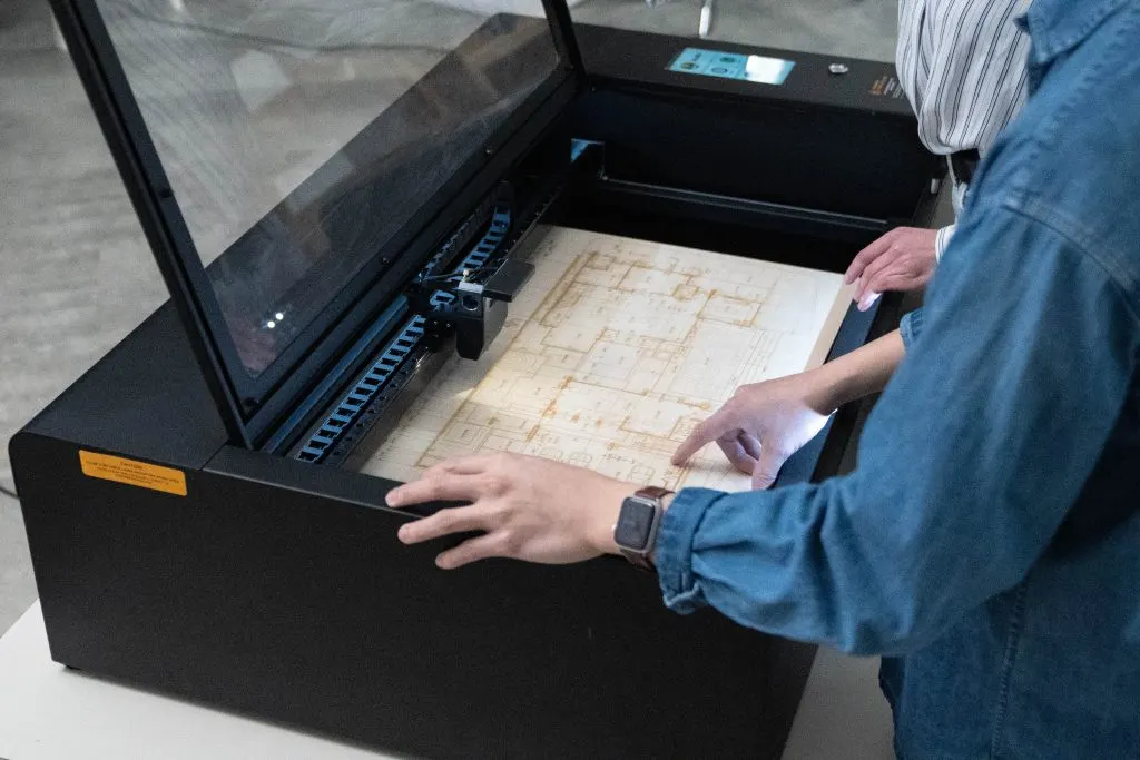 CO2 laser cutter working on a project