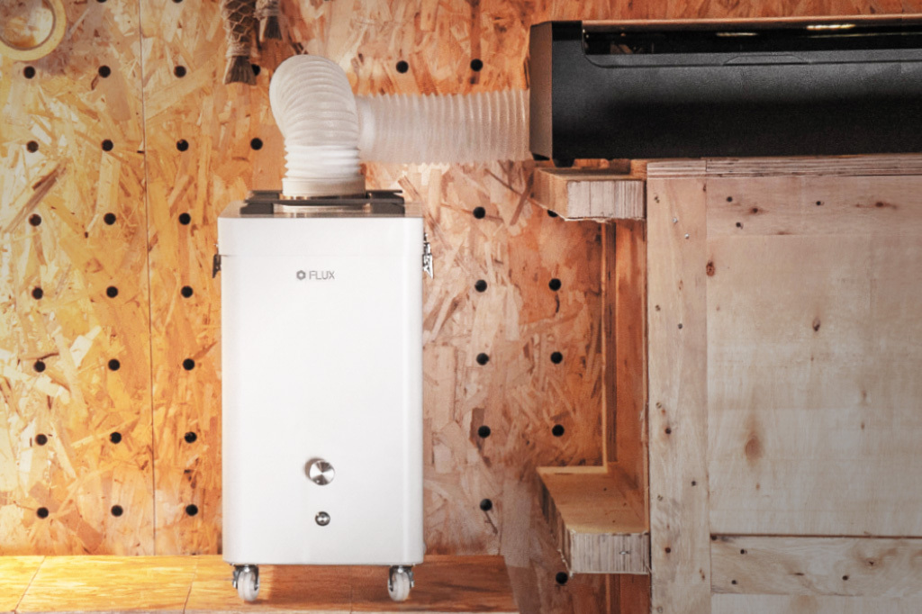 Beam Air connected to a FLUX laser cutter