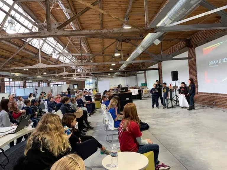 Students presenting their prototype to a panel