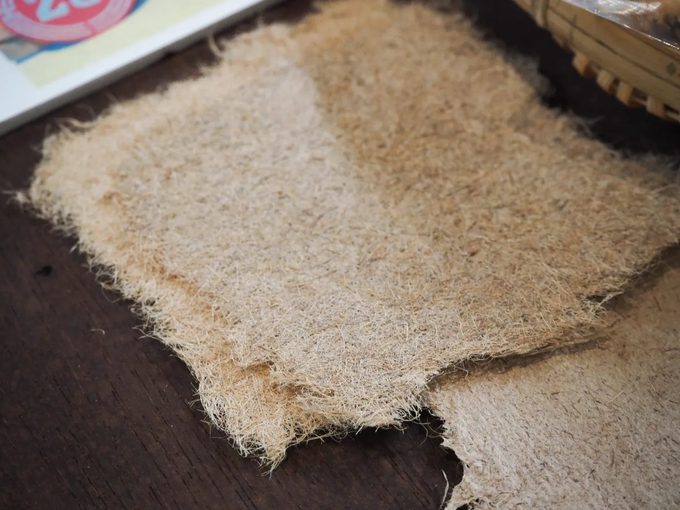 Fibrous natural materials used to make hand sheet paper