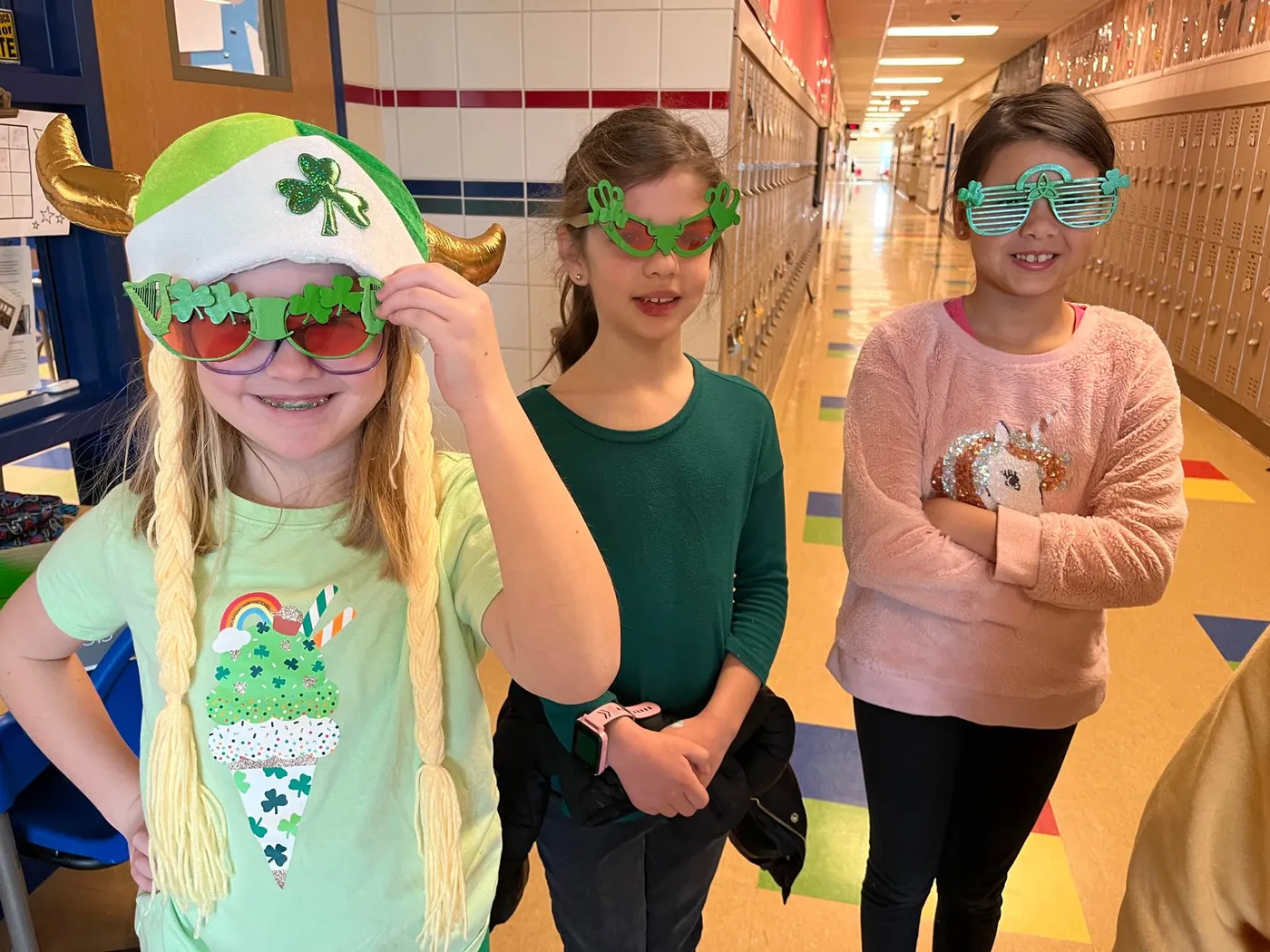 Students wearing laser-cut Saint Patrick’s Day frames