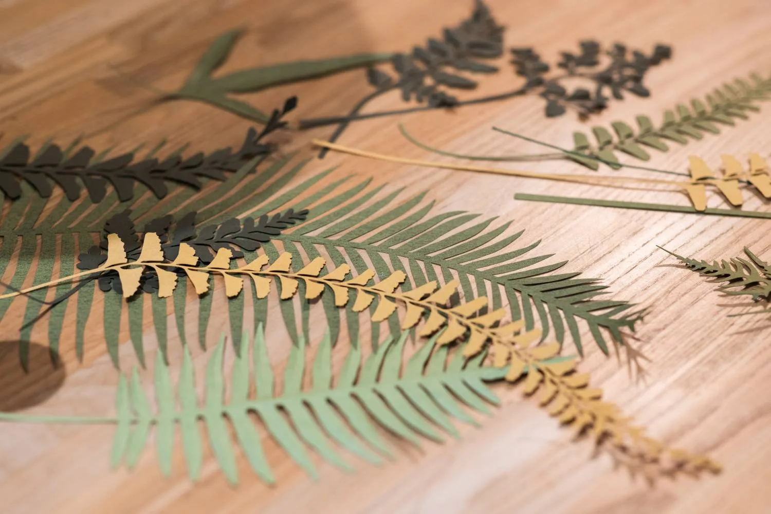 Layered paper art assembled from laser-cut parts