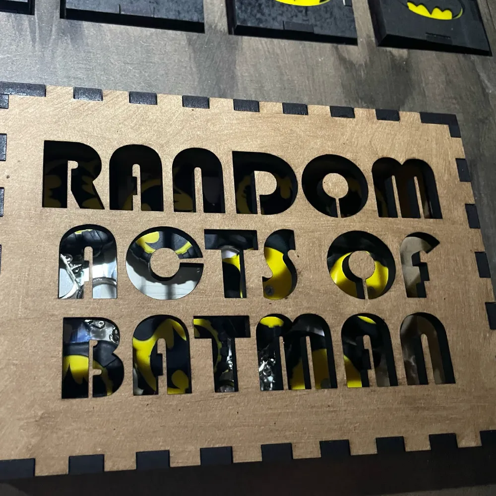 Laser-cut Batman lettering fitted to Kit Walker’s customized car