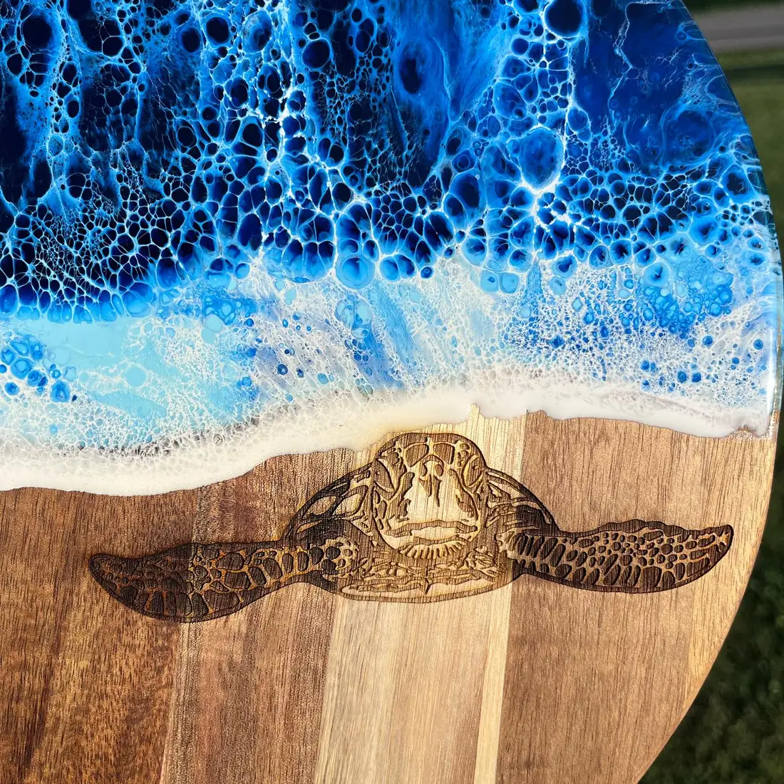 Blue ocean resin art over a laser-engraved sea turtle